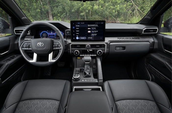 Interior Step inside the 2024 Tacoma, and you'll find a well-designed, comfortable, and spacious interior. Key interior features include: Seating Capacity: The Tacoma comfortably seats five passengers, with ample legroom and headroom in both the front and rear seats. High-Quality Materials: The interior is crafted from high-quality materials, giving it a premium feel. Soft-touch surfaces and well-designed controls enhance the overall driving experience. Cargo Space: The Tacoma offers plenty of storage options, including under-seat storage and a spacious center console. Infotainment System: The 8-inch touchscreen infotainment system is intuitive and user-friendly. It comes with Apple CarPlay and Android Auto, allowing you to seamlessly connect your smartphone and access your favorite apps, music, and navigation. Comfort Features: Available heated seats, dual-zone automatic climate control, and a leather-wrapped steering wheel add to the comfort and convenience.